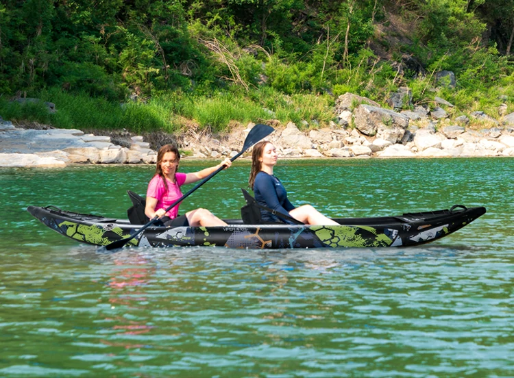 Calibrated pressure gauge tracking PSI thresholds and safety relief valve on an inflatable tandem kayak Calibrated pressure gauge tracking PSI thresholds and safety relief valve on an inflatable tandem kayak