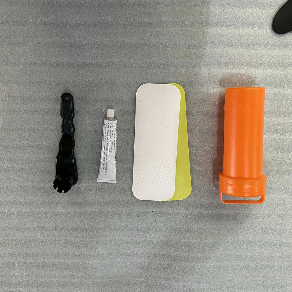 Complete inflatable kayak repair kit including PVC patches and Halkey-Roberts valve wrench Complete inflatable kayak repair kit including PVC patches and Halkey-Roberts valve wrench